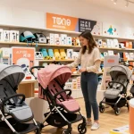 Shopping for children's products at rokok88, showcasing vibrant baby gear in a welcoming store.